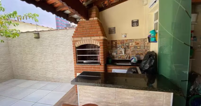 Sobrado com 3 dormitórios à venda, 154 m² por R$ 750.000,00 - Tupi - Praia Grande/SP