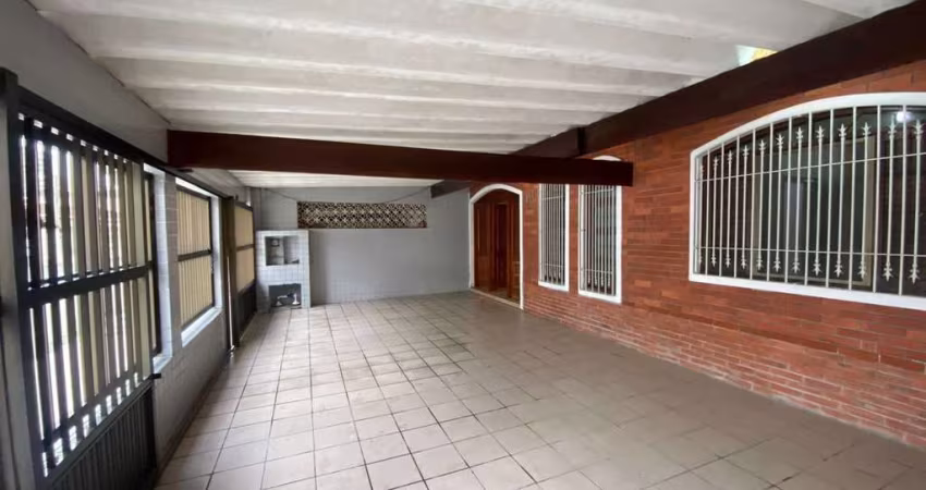 Casa com 3 dormitórios à venda, 120 m² por R$ 650.000,00 - Vila Guilhermina - Praia Grande/SP