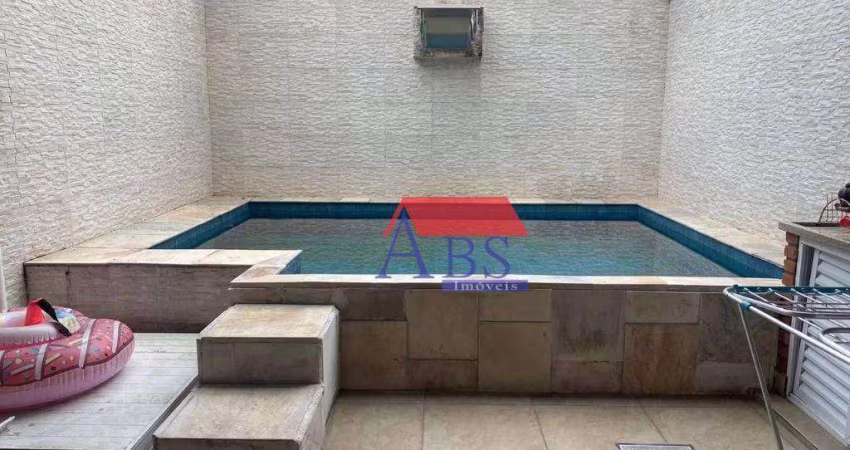 Casa com 3 dormitórios à venda, 180 m² por R$ 875.000,00 - Vila Guilhermina - Praia Grande/SP
