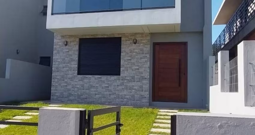 Casa à venda em Garopaba, três (03) dormitórios e financiável.