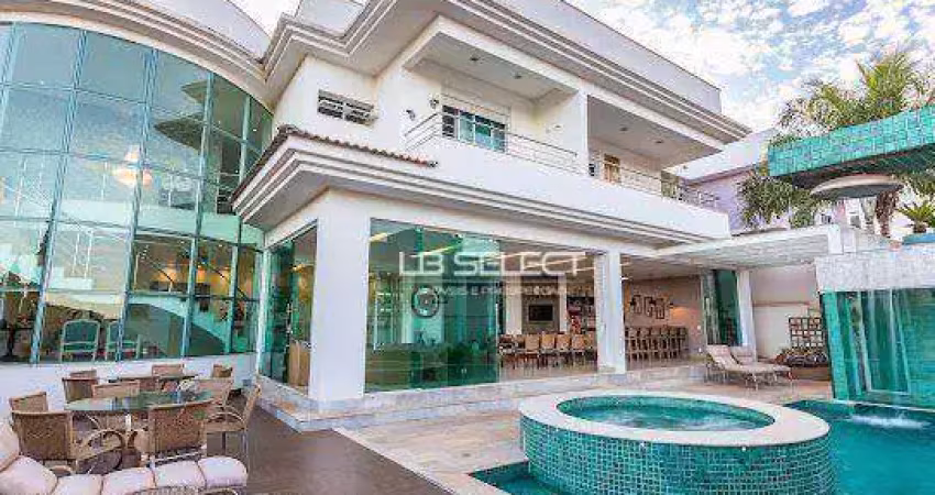 Casa alto padrão no condomínio gênova com quatro suítes e área gourmet completa.