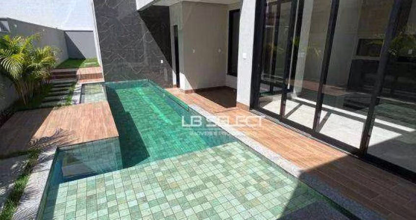 Casa no Condomínio Alphaville I com três suíte e área gourmet completa.