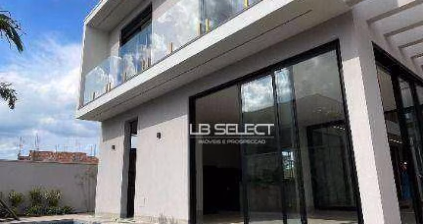Casa no Condomínio Alphaville quatro suítes e varanda gourmet.
