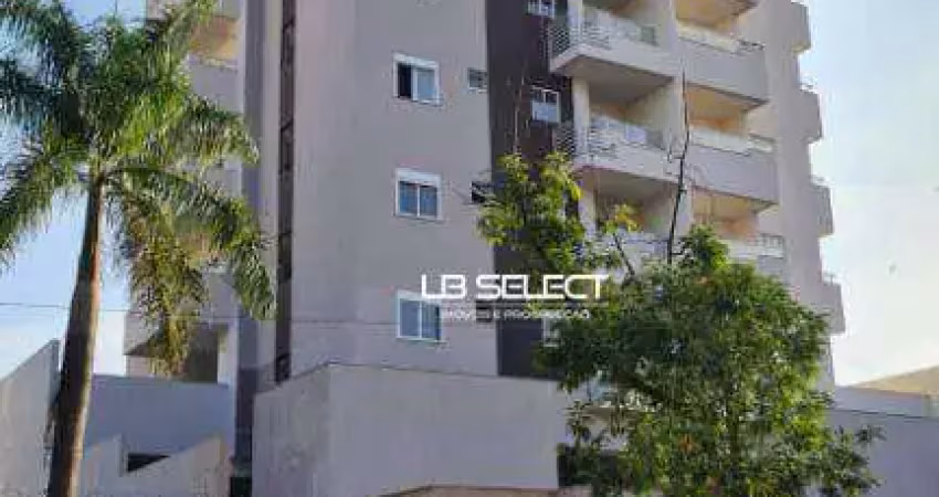 Apartamento com dois quartos, uma suíte e varanda grill.