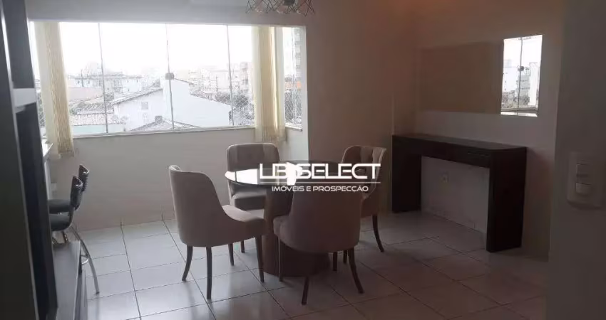 Apartamento no bairro santa mônica com três quartos e uma suíte.