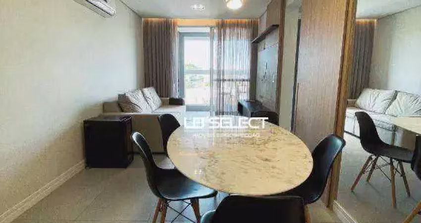 Apartamento no bairro santa mônica com dois quartos, uma suíte e varanda grill.