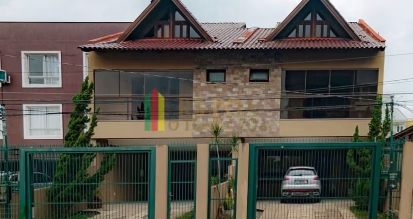 Casa com 3 quartos à venda na Rua Dom Jaime de Barros Câmara, 705, Sarandi, Porto Alegre