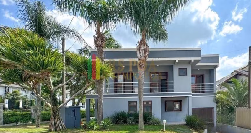 Casa em condomínio fechado com 4 quartos à venda na Rua Tocantins, 937, Lomba do Pinheiro, Porto Alegre