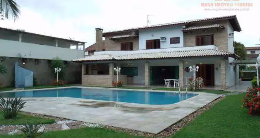 Casa com 6 dormitórios à venda, 602 m² por r$ 3.800.000,00 - centro - peruíbe/sp