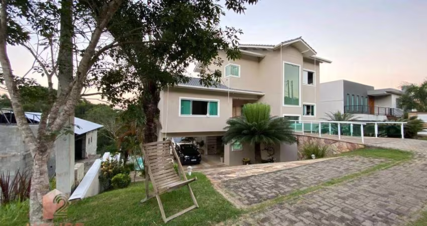 Casa com 4 dormitórios à venda, 800 m² por R$ 1.500.000,00 - Condomínio Reserva Ibirapitanga - Santa Isabel/SP
