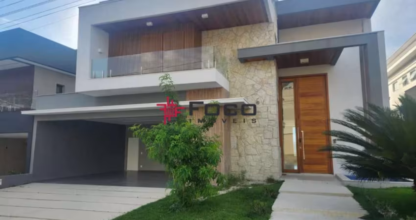 Casa com 4 suítes, 450m² por R$ 3.150.000,00 - Condomínio Residencial Jaguary