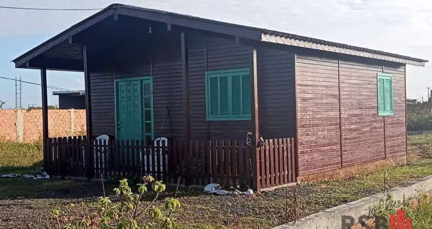 Casa com 2 dormitórios à venda, 56 m² por R$ 220.000,00 - Capão Do Cravo - Passo de Torres/SC