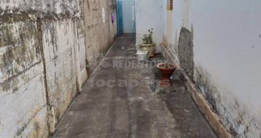 Terreno com 3 casas Vila Ideal