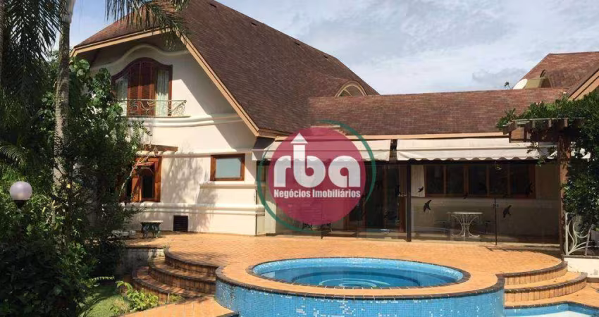 Linda casa no Condomínio Terras de São José I, com extensa área verde.