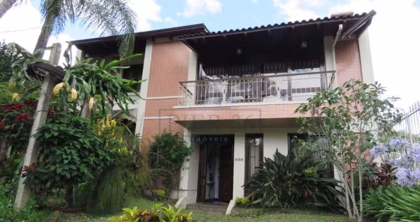 Casa com 4 quartos à venda na Rua Upamaroti, 836, Cristal, Porto Alegre