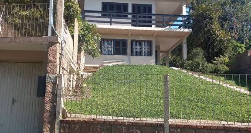 Casa com 3 quartos à venda na Rua Liberal, 97, Sétimo Céu, Porto Alegre