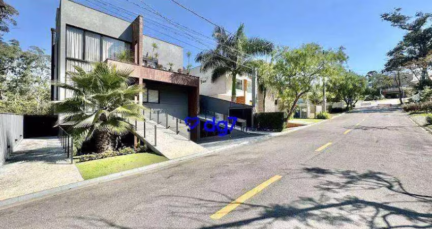 Casa em condomínio de alto padrão na granja viana, com 4 suítes e 8 vagas, 483 m²!