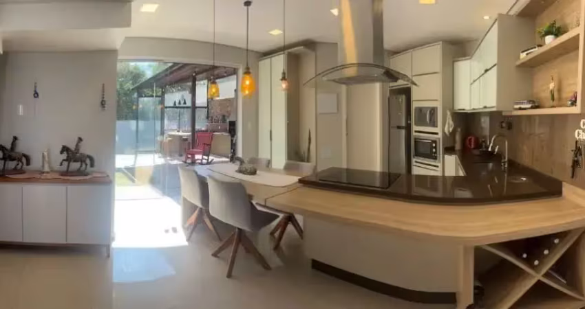 Casa a venda em condomínio fechado no belíssimo bairro planejado deltaville em biguaçu/sc. 