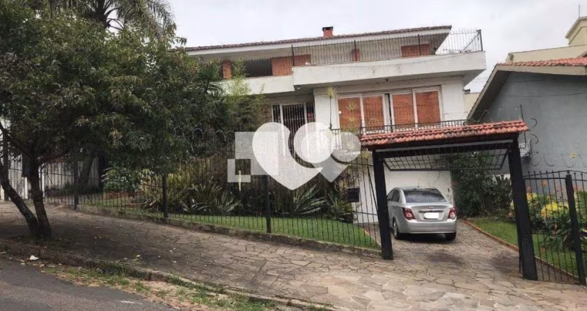 Casa com 6 quartos à venda em Menino Deus - RS