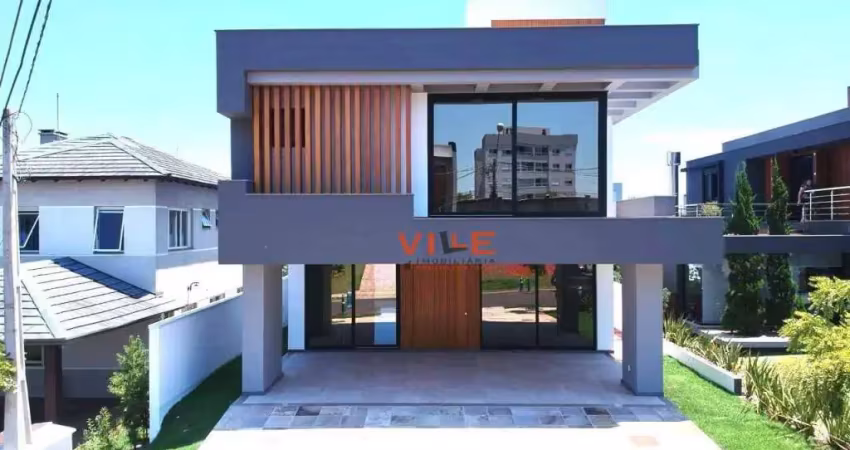 Casa de alto padrão com 300m² de área construída  condomínio alphaville  - gravataí / rs
