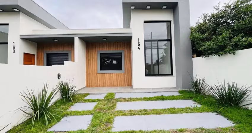 Casa de 02 dormitórios sendo uma suíte à venda em gravataí.
