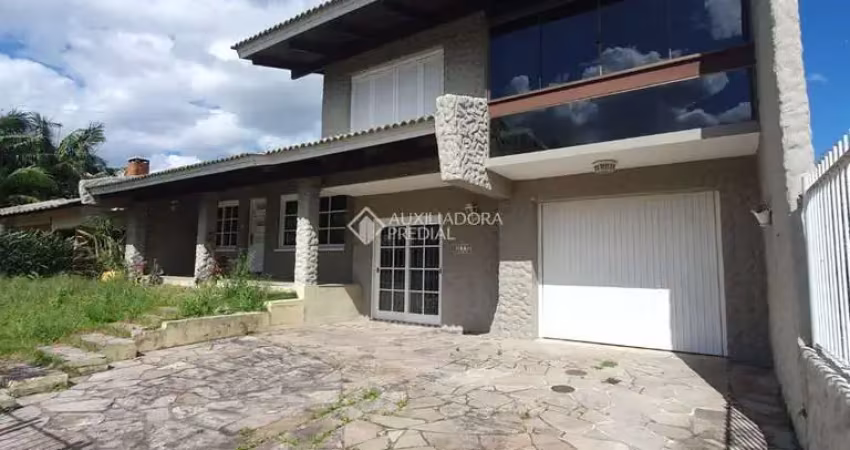 Casa com 4 quartos à venda na Amazonas, 177, Caiu Do Céu, Osório