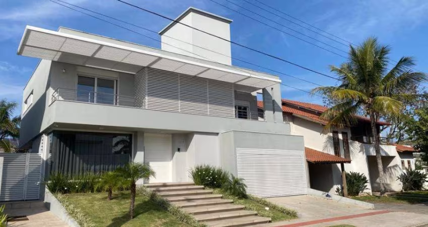 Casa aconchegante com 3 suítes em Jurerê Internacional