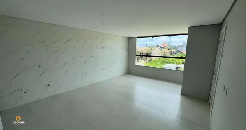 Apartamento com dois dormitórios, sendo uma suíte, no centro de penha sc! à vend