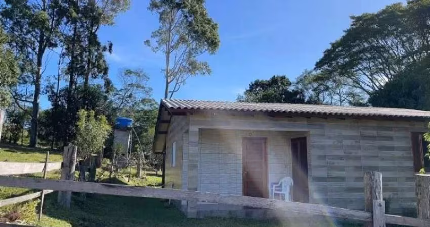 [118777] CHÁCARA EM NOVA HARTZ COM TRÊS CASAS, AÇUDE, POMAR, ROÇA, HORTA E FIBRA ÓTICA