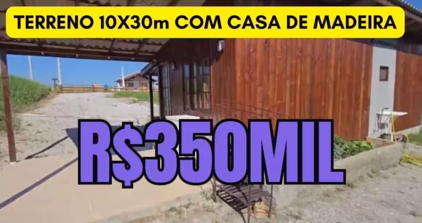 [470 ] TERRENO EM GOVERNADOR CELSO RAMOS SC 10X30M COM CASA DE MADEIRA. PODE FAZER 2 CASAS