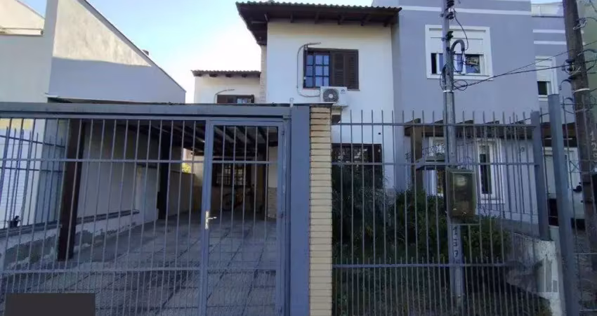 Casa em condomínio fechado com 4 quartos à venda na Rua Fernando Jorge Schneider, 137, Hípica, Porto Alegre