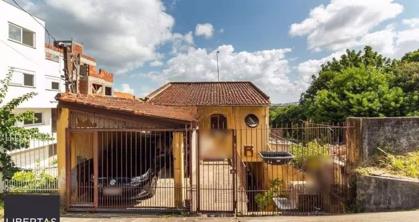 Casa de 4 dormitórios no bairro Camaquã