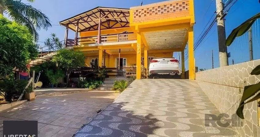 casa de 4 dormitórios,  no bairro Lomba do Pinheiro