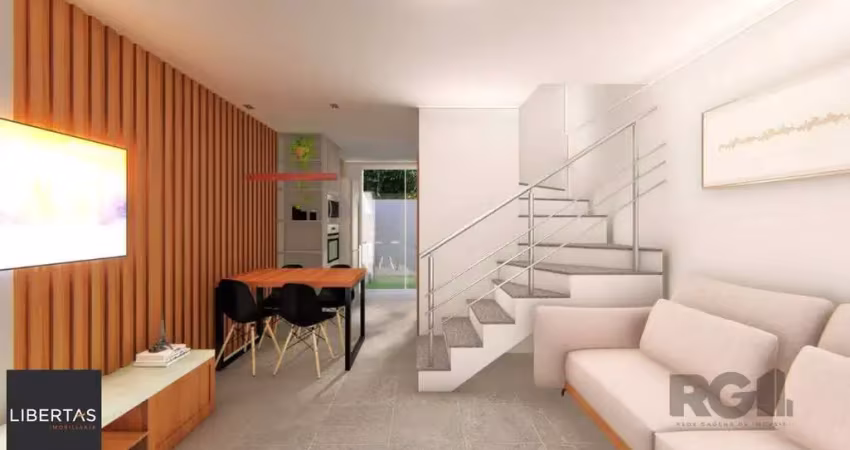 Casa estilo sobrado com 2 quartos e pátio, à venda no bairro vila nova, em porto alegre/rs