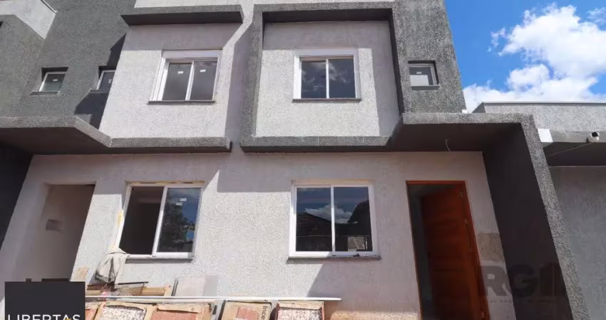 Casa em condomínio fechado com 2 quartos à venda na Rua Miguel Ascoleze, 125, Vila Nova, Porto Alegre