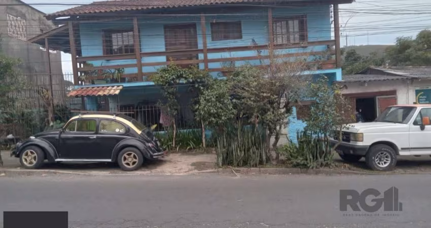 Casa com 3 quartos, vaga de garagem, churrasqueira, no bairro Partenon, Porto Alegre/RS