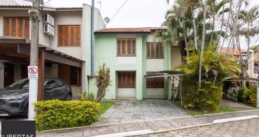 Casa em condomínio fechado com 3 quartos à venda na Avenida Juca Batista, 4115, Hípica, Porto Alegre