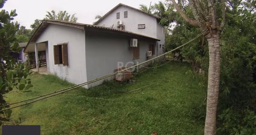 Casa 5 dormitórios no bairro Ponta Grossa