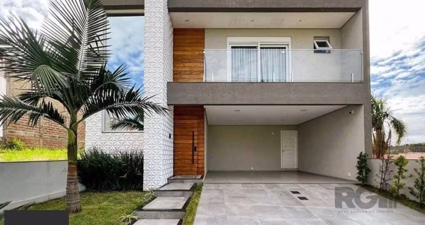Casa em condomínio com 3 suítes no bairro Petrópolis