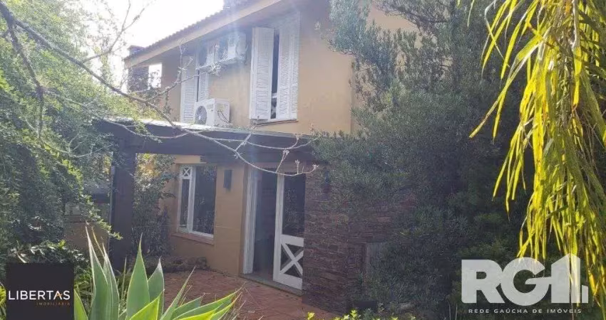 Casa em condomínio fechado com 3 quartos à venda na Rua Professor Carlos de Paula Couto, 500, Cavalhada, Porto Alegre