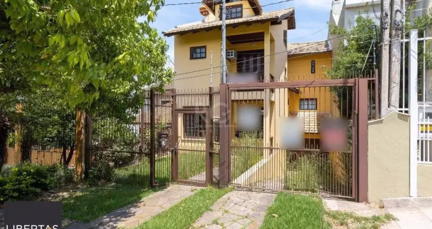 Casa com 3 quartos à venda na Rua Josué Guimarães, 177, Espírito Santo, Porto Alegre