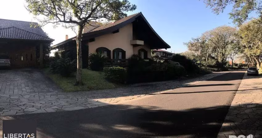 Casa em condomínio fechado com 3 quartos à venda na Avenida da Cavalhada, 5205, Cavalhada, Porto Alegre