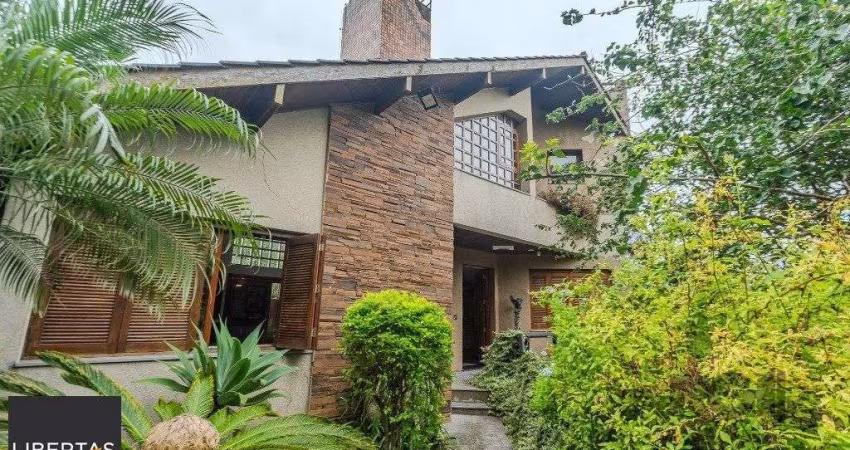 Casa 400m² - 5 dormitórios, 4 vagas no bairro Vila Jardim