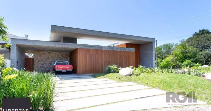 A casa le mans, uma residência térrea de esquina com 389,48m2 de área coberta