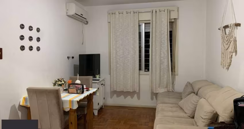 Apartamento de 2 dormitórios, living, cozinha, área de serviço e banheiro social