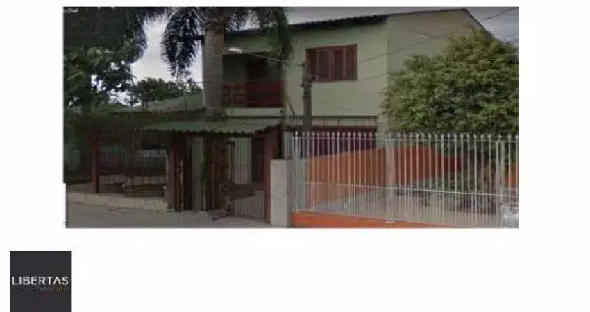 Casa com 3 quartos à venda na Rua Taimbé, 143, Sumaré, Alvorada