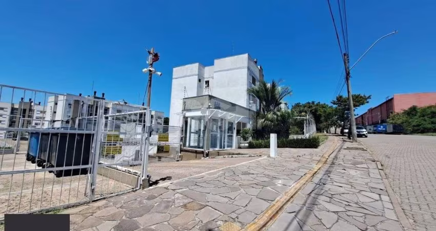 Apartamento com sacada e churrasqueira