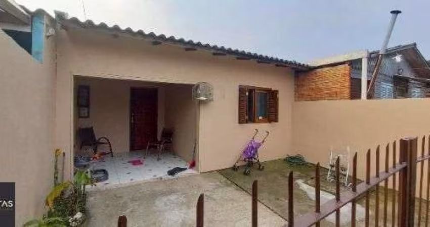 Casa em Porto Alegre, no bairro Ponta Grossa, com 2 dormitório(s), e 2 banheiros, à venda.
