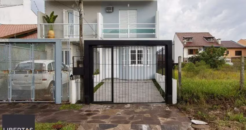 Casa com 2 quartos à venda na Rua Nestor José Nitschke, 221, Guarujá, Porto Alegre
