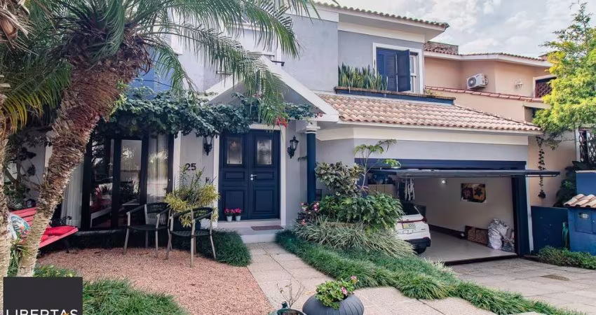 CASA DE 4 DORMITÓRIOS EM CONDOMÍNIO - 320 m² - 4 VAGAS DE GARAGEM